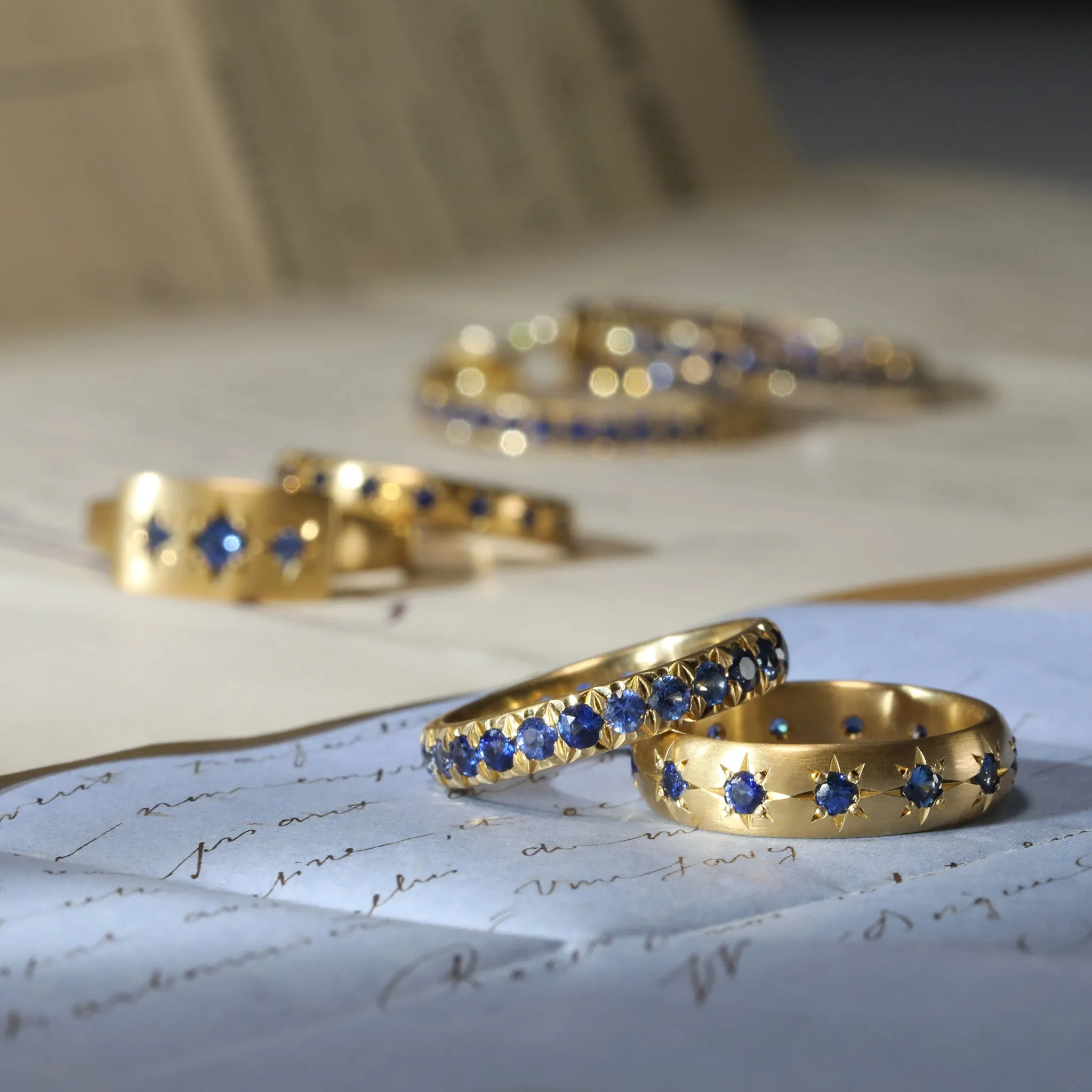 20K Chunky Curved Signet Ring with Three Star-Set Blue Sapphires