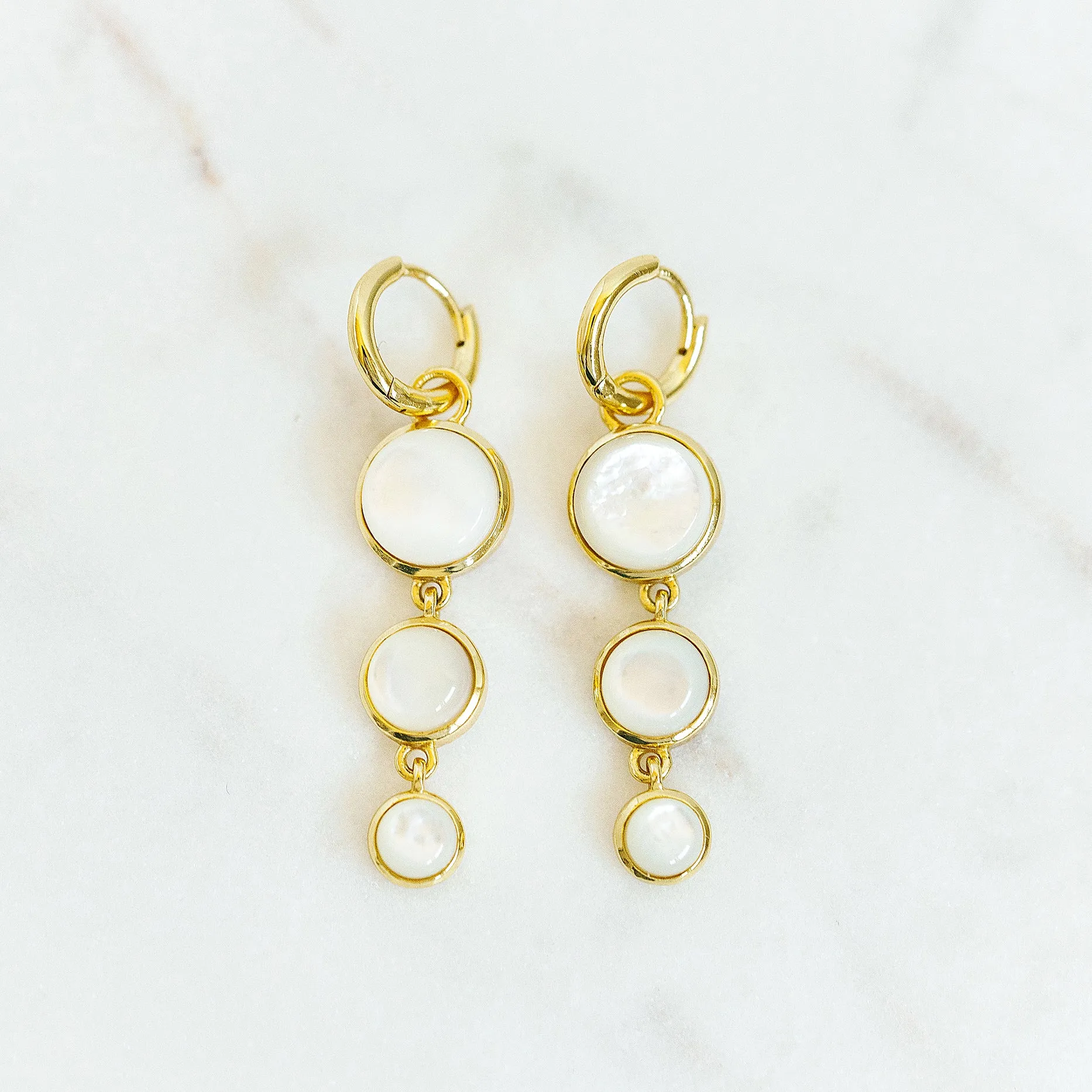 Mini Dropping Circles Huggie Hoop Earrings in Mother of Pearl