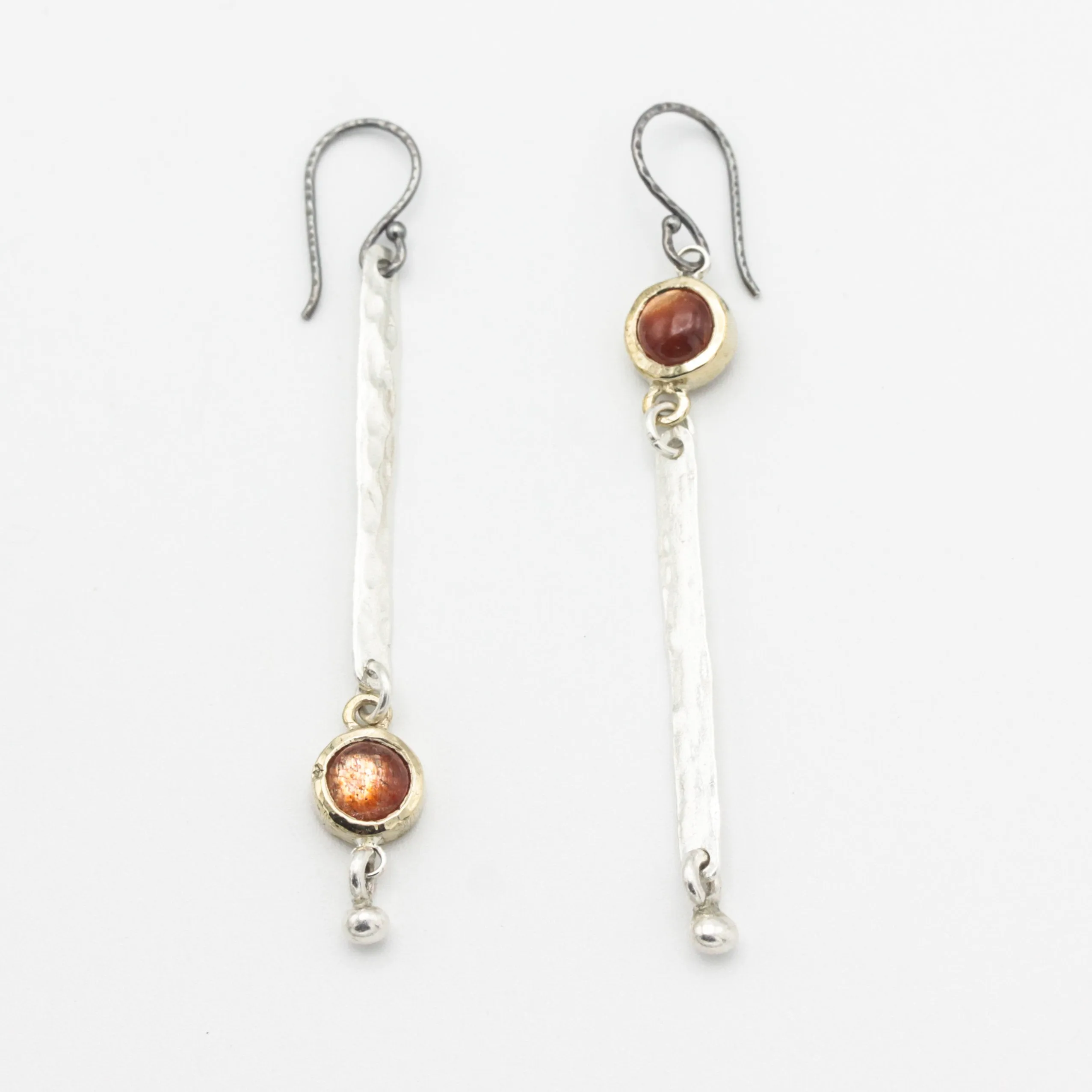 Round Sunstone earrings in brass bezel setting with silver bar hammer textured on sterling silver hooks style