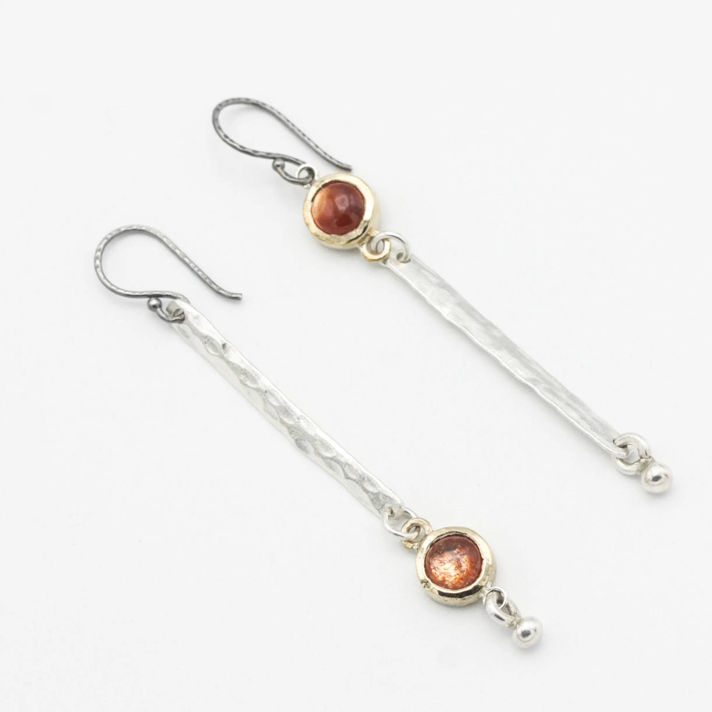 Round Sunstone earrings in brass bezel setting with silver bar hammer textured on sterling silver hooks style