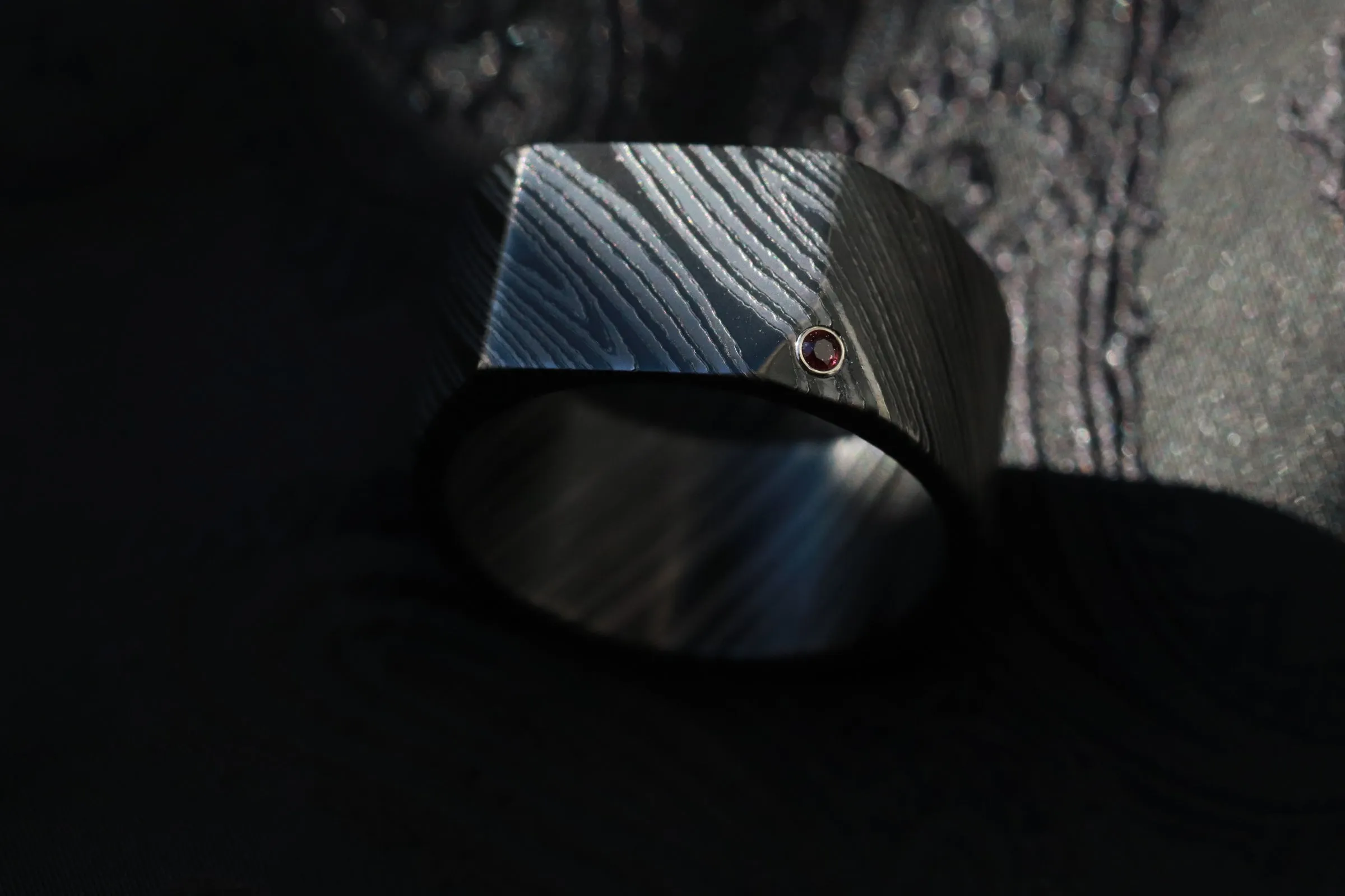 Ruby Signet ring - zirconium nio damascus, dark damascus wedding band red ruby