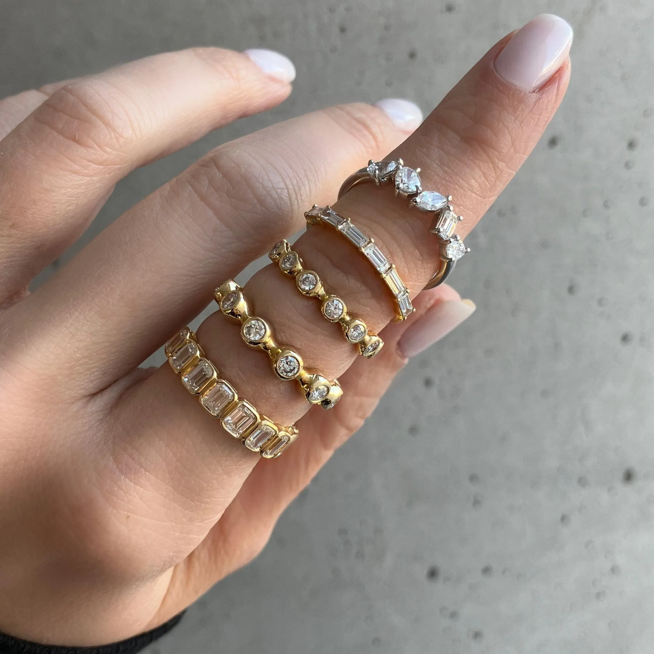 Seven Gold Bezel Diamond Ring